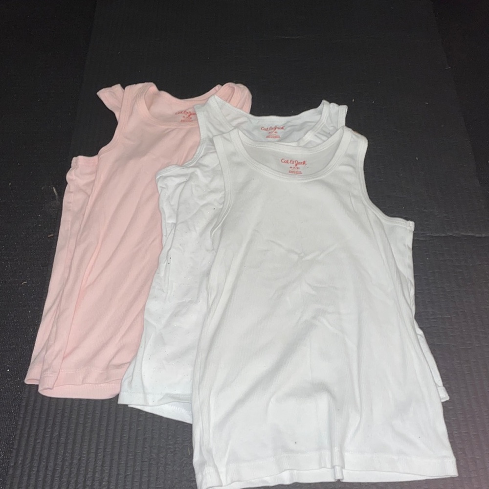 pink and white tank top set.
